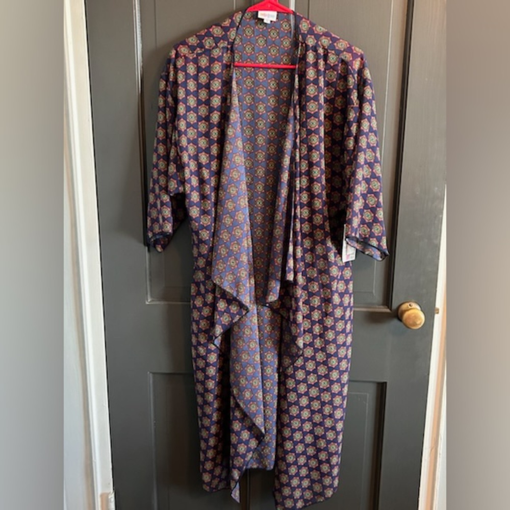 Medium Shirley from LuLaRoe.  Blue, tan and red.